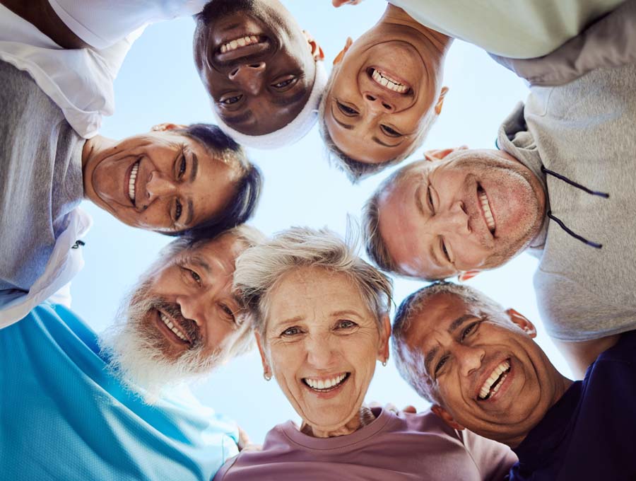 Portrait, senior or friends with fitness goals, support or hope in huddle bonding in training, spor.